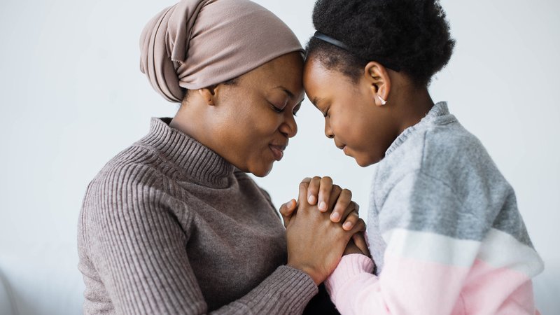 mother comforting child