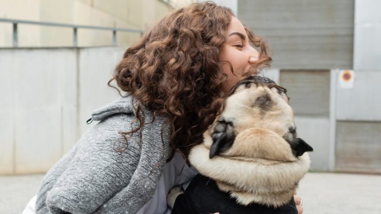woman reunited with dog
