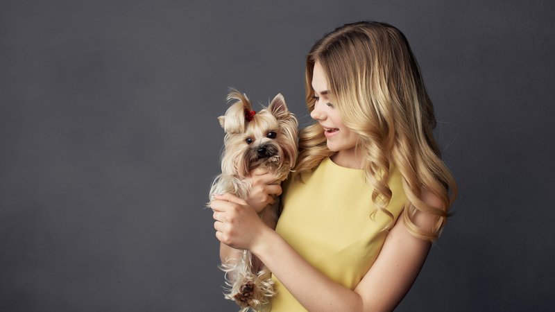 celebrity with pet dog
